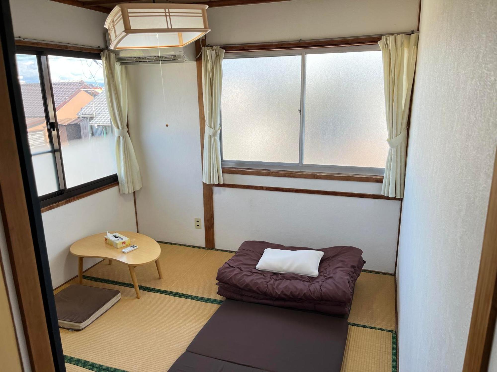 ゲストハウスまちかど Guest House Machikado Ibusuki Ruang foto