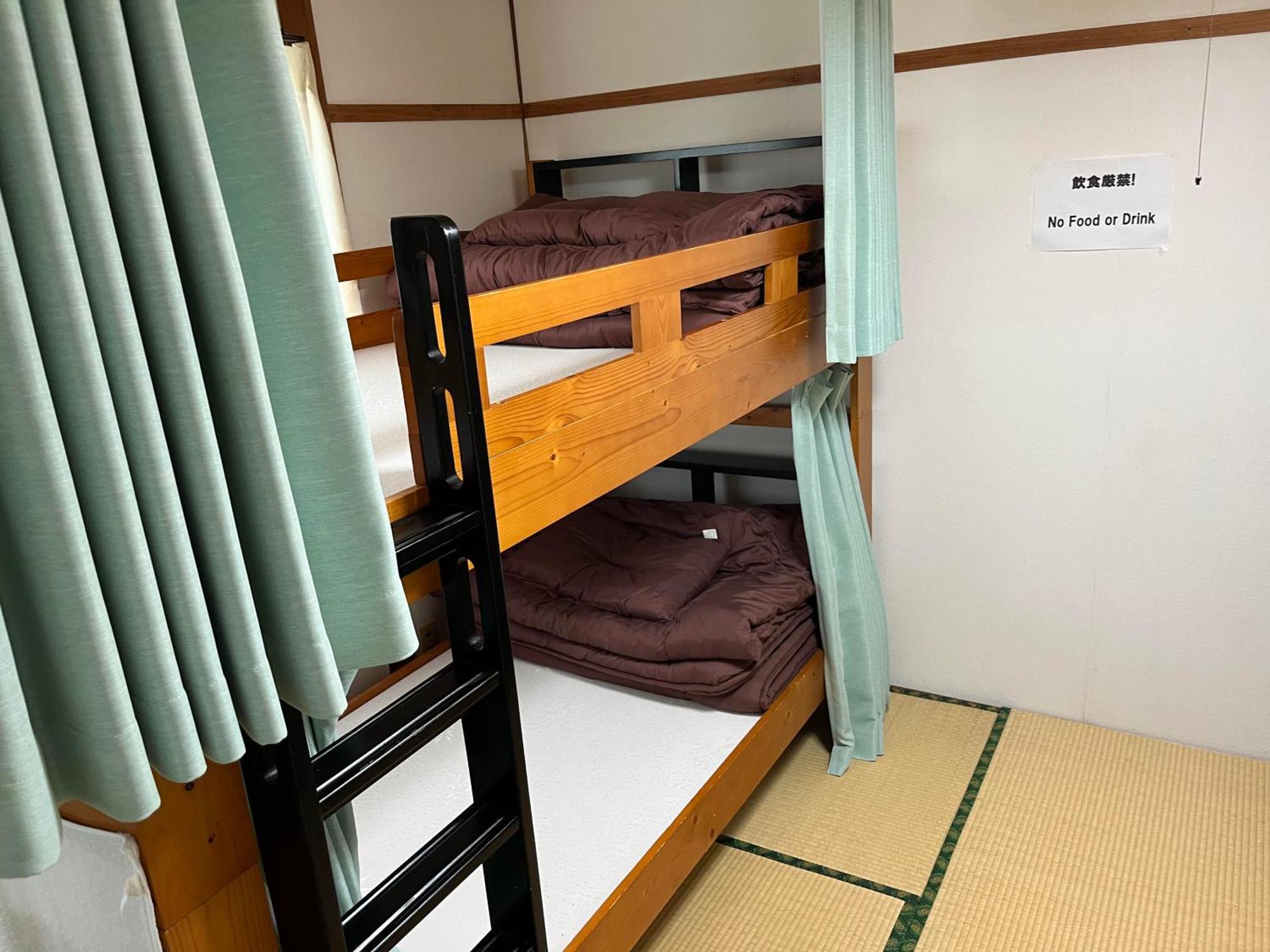 ゲストハウスまちかど Guest House Machikado Ibusuki Ruang foto